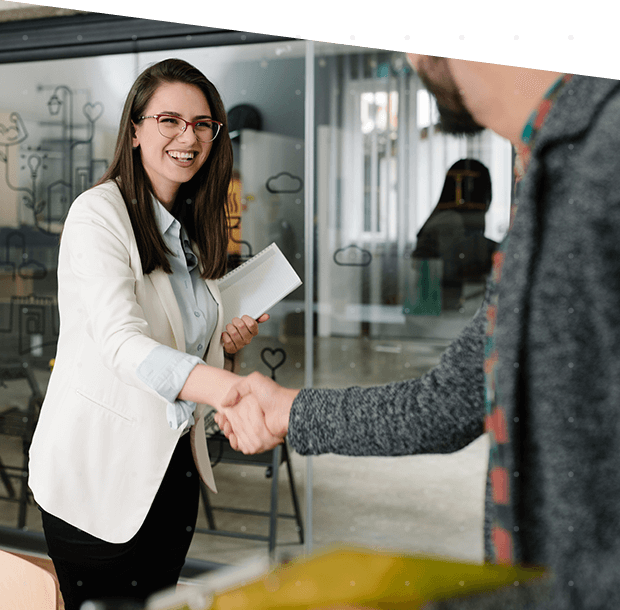 woman and man shaking hands