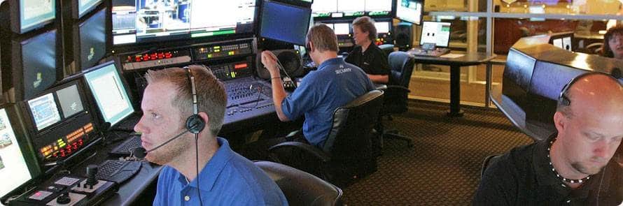 security personnel in a monitoring room