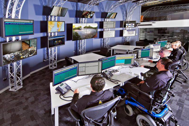 security personnel in a monitoring room