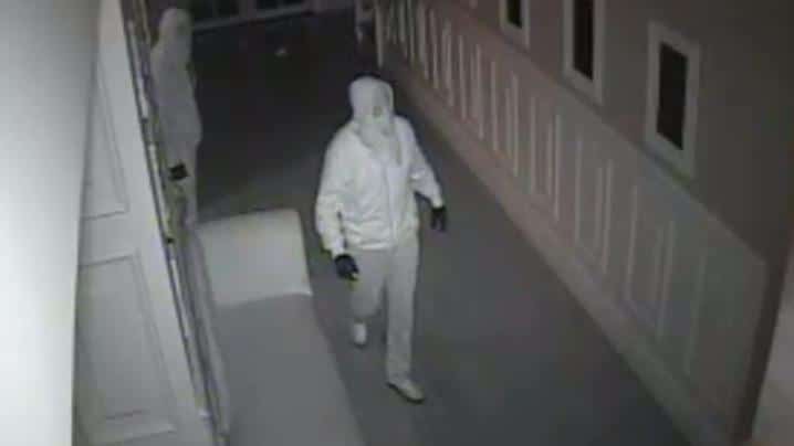 security camera footage of burglars in a house