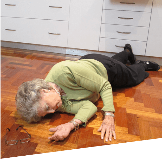 an old woman lying on the floor