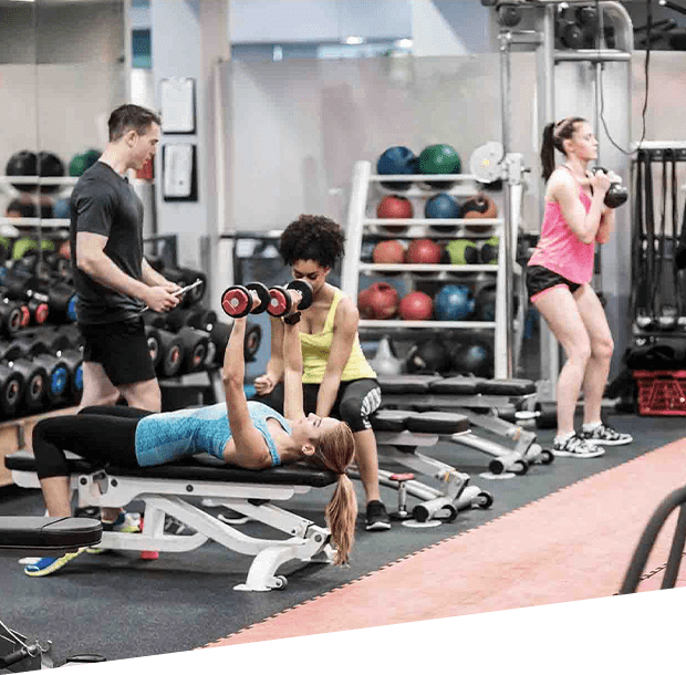 people exercising in the gym