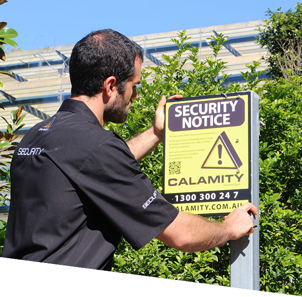 a man putting security notice
