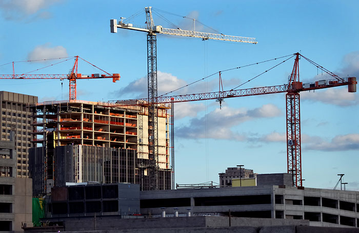 crane brooms construction site